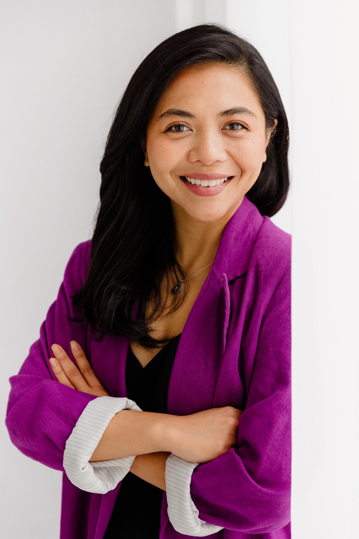 Portrait of Ratu Nida in a purple jacket