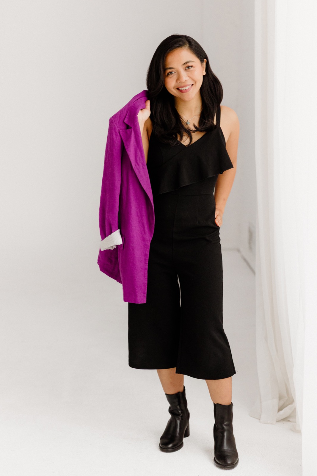 Ratu Nida full-length portrait in a purple jacket